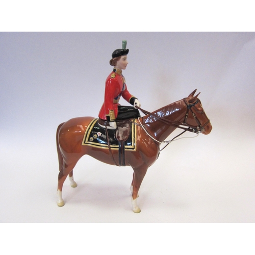 8126 - A Beswick figure of H.M. Queen Elizabeth II on Imperial horse, in chestnut gloss, model no. 1546, (l... 