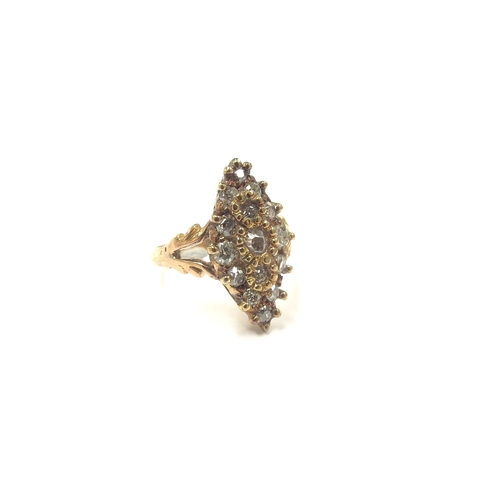 9013 - An unmarked gold navette ring set with old cut diamonds, open shoulders. Size G, 3.3g