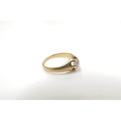 9051 - A diamond solitaire ring in open claw mount, marks rubbed. Size M, 0.70ct approx irregular shaped di... 