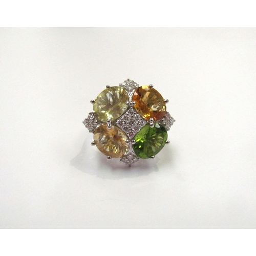 9311 - A green, yellow and orange quartz, peridot and diamond cluster ring, 0.50ct diamond total approx, st... 