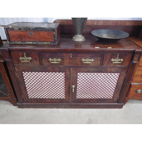 2094 - A 19th Century mahogany sideboard with brass grille and two doors