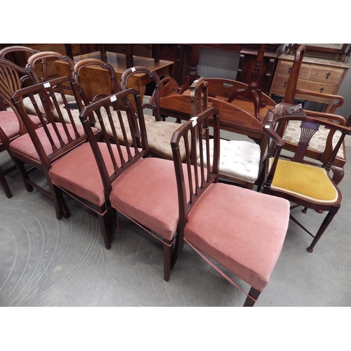 2141 - A set of three Georgian oak dining chairs, stylised slatted back, on square tapering legs   (D)