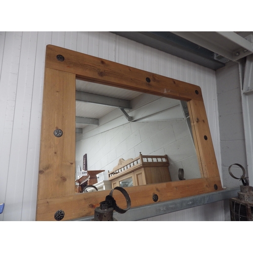 2223 - A large pine wall mirror