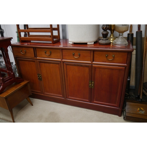 2305 - An Oriental hardwood sideboard, four drawers over four doors, 151 x 48cm   (R) £10