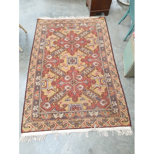 2339 - A mustard and grey Turkish rug, 194cm x 125cm