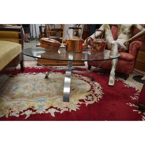 2350 - A mid 20th Century glass top coffee table on shaped alloy base   (R) £10