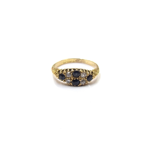 9354 - An 18ct gold old cut diamond and sapphire ring in scroll mount. Size N, 3g        (E) £100-120