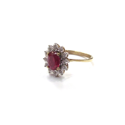 9326 - A 9ct gold ruby and illusion set diamond cluster ring. Size P, 2.3g