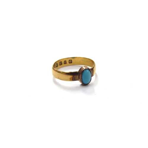 9404 - A 22ct gold band set with an oval turquoise. Size I/J, 2g