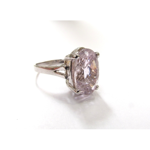 9325 - A white gold ring set with a large oval pink Kunzite 15mm x 10mm, stamped 14k. Size R, 6.6g         ... 