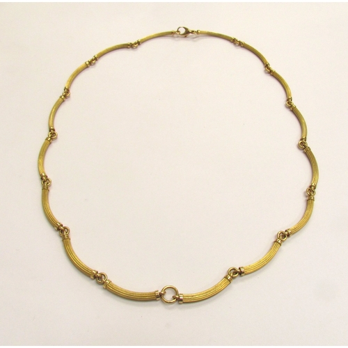 9169 - A gold necklace made from curved textured bar links, stamped 750, 54cm long, 61.8g   (R) £2400