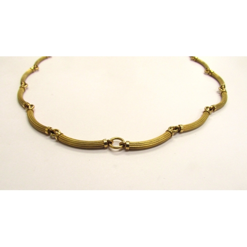 9169 - A gold necklace made from curved textured bar links, stamped 750, 54cm long, 61.8g   (R) £2400