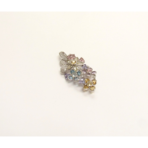 9158 - A white gold multiple stone flower cluster pendant/brooch, comprising of multi-coloured quartz, topa... 