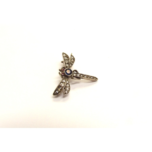 9313 - A dragonfly brooch with ruby eyes, sapphire thorax and old cut diamond abdomen and wings, unmarked, ... 