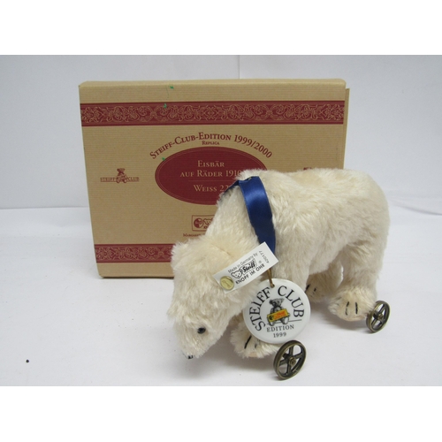 7099 - A boxed Steiff Club Edition 1999, 420177 Eisbar Polar Bear, the white mohair bear on metal wheels wi... 