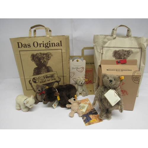 7122 - A collection of Steiff, small and miniature teddy bears, all with gold coloured button and yellow ta... 