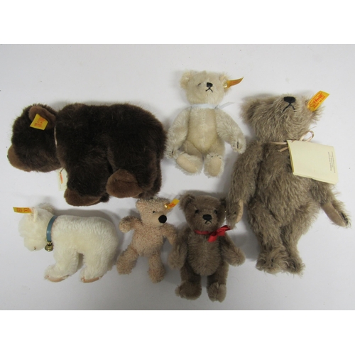 7122 - A collection of Steiff, small and miniature teddy bears, all with gold coloured button and yellow ta... 