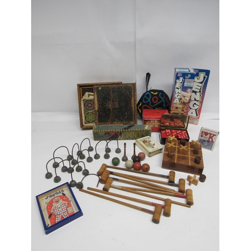 7127 - A mixed group of toys and games including early 20th Century table top croquet set, solitaire set in... 