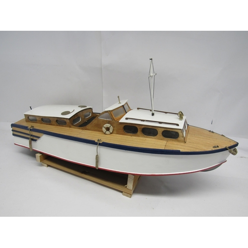 7302 - A well modelled kit built wooden model of a river cruiser with brass rudder, fitted with electric mo... 