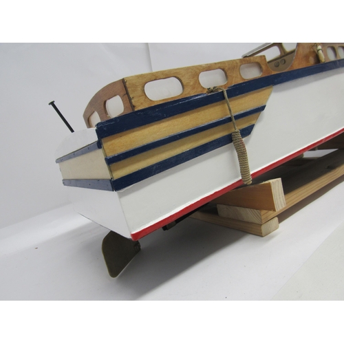 7302 - A well modelled kit built wooden model of a river cruiser with brass rudder, fitted with electric mo... 