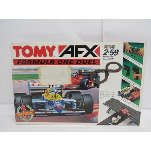 7207 - A Tomy AFX Formula One Duel slot racing set