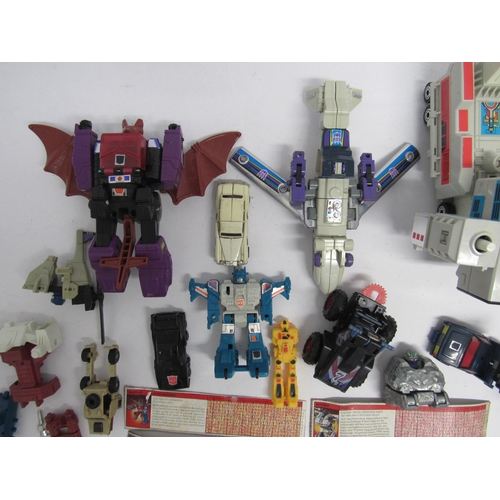 7019 - A collection of Vintage playworn Transformers and similar vehicles, figures, accessories and spares