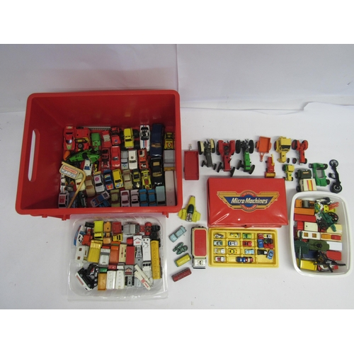 7245 - A collection of playworn diecast and plastic model vehicles including Micro Machines carry case and ... 