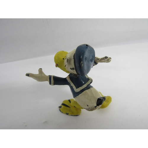 7189 - A Sacul Walt Disney Donald Duck hand painted hollow cast figure, 5cm tall