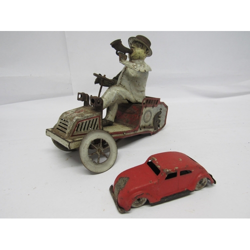 7170 - A heavily worn Lehmann (Germany) Tut Tut white and red clockwork tinplate motor car, lacking rear ax... 