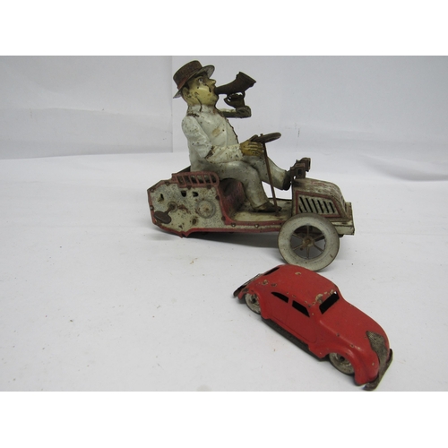 7170 - A heavily worn Lehmann (Germany) Tut Tut white and red clockwork tinplate motor car, lacking rear ax... 