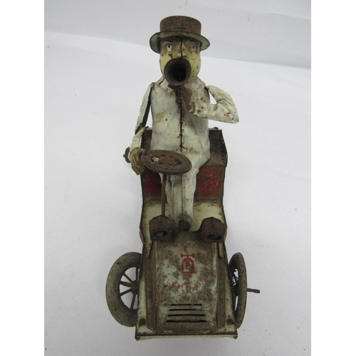 7170 - A heavily worn Lehmann (Germany) Tut Tut white and red clockwork tinplate motor car, lacking rear ax... 