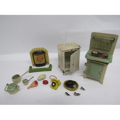 7187 - A group of hand painted lead dolls house furniture and accessories to include Barrett gas cooker and... 