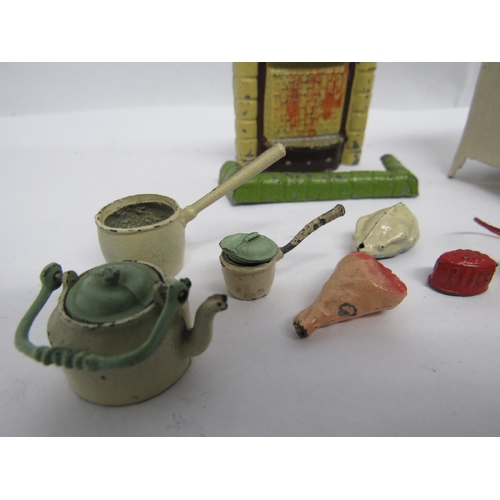 7187 - A group of hand painted lead dolls house furniture and accessories to include Barrett gas cooker and... 