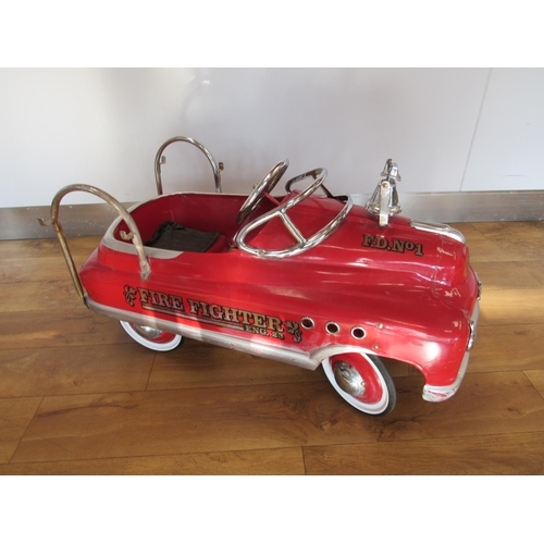 7092 - An F.D No.1 Fire Fighter child's pressed steel pedal car with bell to front, 90cm long