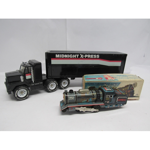 7175 - A Matchbox pressed steel Midnight X-Press lorry and a boxed Daiya (Japan) Trans-Continental Express ... 