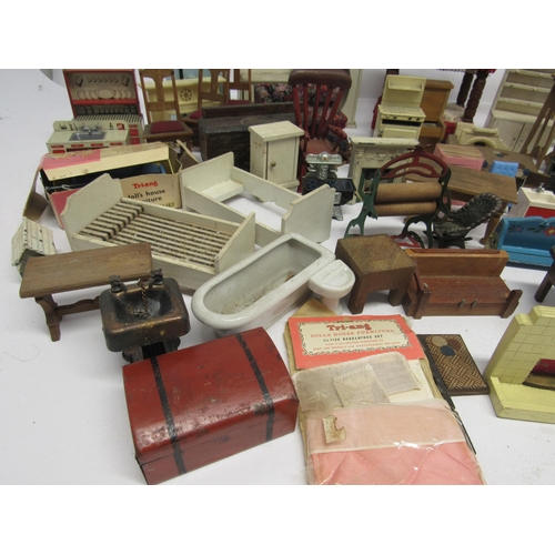 7143 - A collection of wooden, metal and plastic dolls house furniture, including boxed Triang Spot-On hamm... 