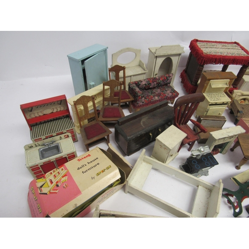 7143 - A collection of wooden, metal and plastic dolls house furniture, including boxed Triang Spot-On hamm... 