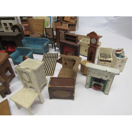 7143 - A collection of wooden, metal and plastic dolls house furniture, including boxed Triang Spot-On hamm... 