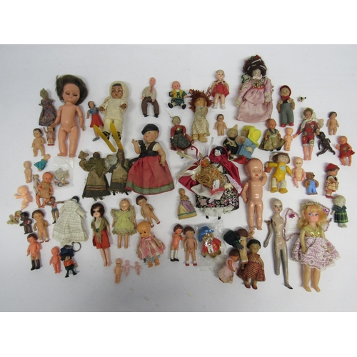 7128 - A collection of dolls house dolls and other small and miniature dolls including celluloid, ceramic, ... 