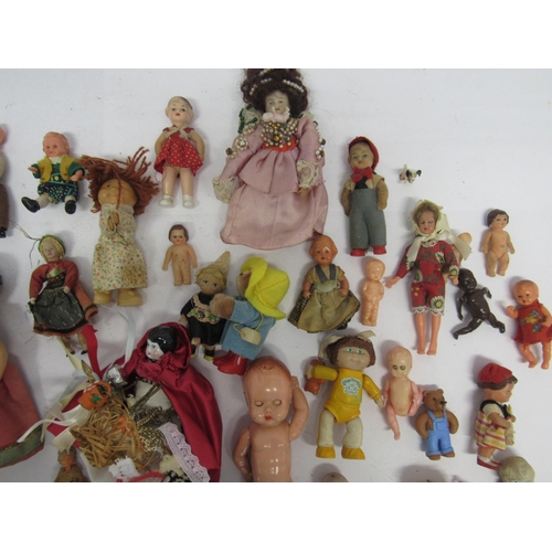 7128 - A collection of dolls house dolls and other small and miniature dolls including celluloid, ceramic, ... 