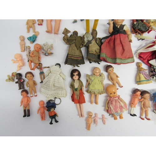 7128 - A collection of dolls house dolls and other small and miniature dolls including celluloid, ceramic, ... 