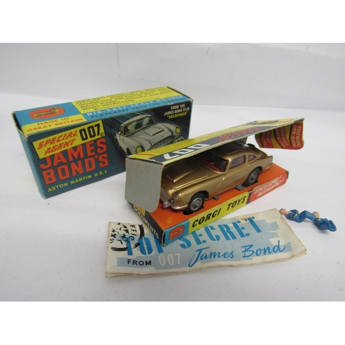 7269 - A boxed Corgi 261 diecast Special Agent 007 James Bond's Aston Martin DB5, from the film 'Goldfinger... 