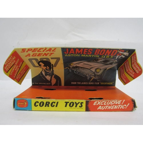 7269 - A boxed Corgi 261 diecast Special Agent 007 James Bond's Aston Martin DB5, from the film 'Goldfinger... 