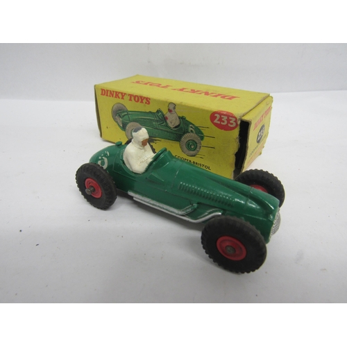 7265 - A boxed Dinky Toys 233 diecast Cooper-Bristol racing car in green with white driver and red plastic ... 