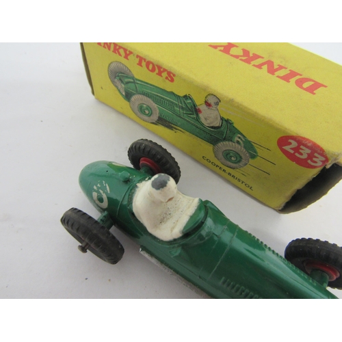 7265 - A boxed Dinky Toys 233 diecast Cooper-Bristol racing car in green with white driver and red plastic ... 