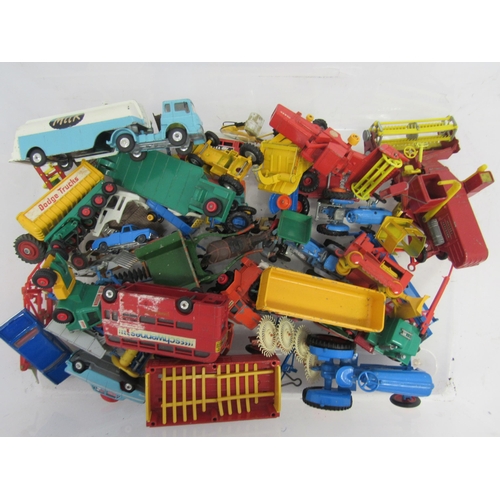 7232 - Assorted loose and playworn diecast vehicles including Corgi milk tanker, Crescent tractor and trail... 