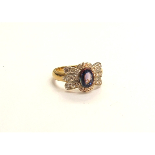 9005 - An 18ct gold sapphire and diamond Art Deco style ring. Size J/K, 4.5g