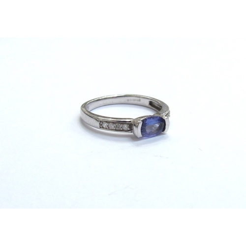 9362 - A 9ct white gold tanzanite and diamond ring. size J, 1.8g