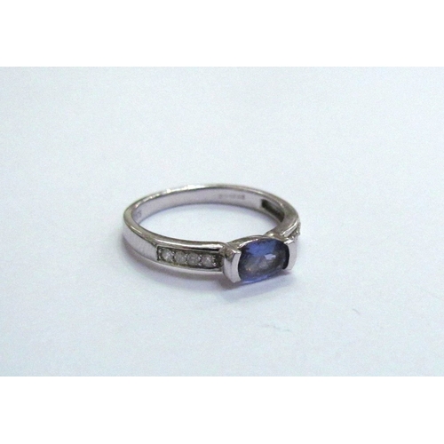 9362 - A 9ct white gold tanzanite and diamond ring. size J, 1.8g