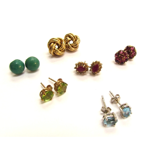 9119 - Six pairs of stud earrings including ruby, turquoise, peridot, topaz and Knot examples